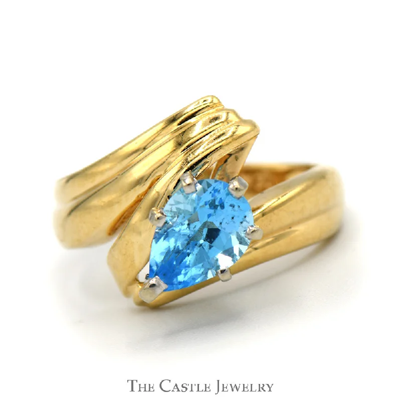 Wedding Ring Set with Sapphire-Pear Cut Blue Topaz Ring with Ridged Bypass Sides in 14k Yellow Gold