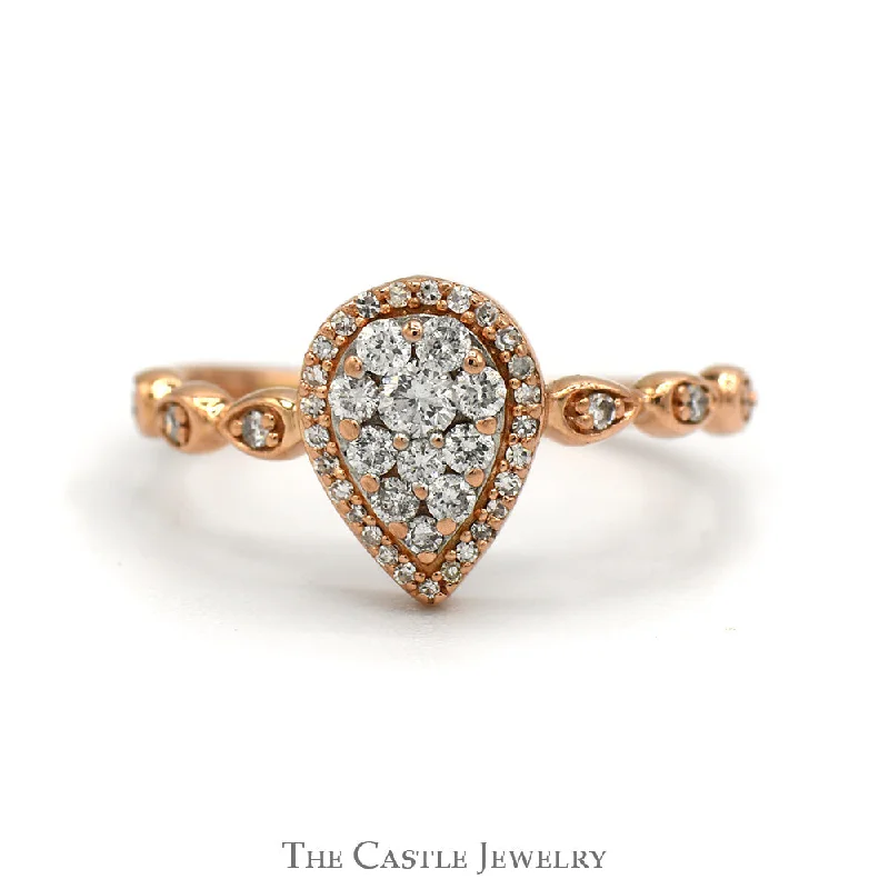 Diamond Anniversary Ring-Pear Shaped Diamond Halo Cluster Ring With .25 CTTW Round Diamonds In 10KT Rose Gold