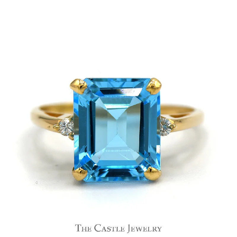 Simple Wedding Ring-Emerald Cut Blue Topaz Ring with Round Diamond Accented Sides in 14k Yellow Gold