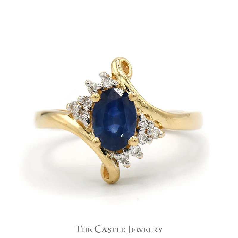 Sparkling Engagement Ring-Oval Sapphire Ring With .05 CTTW of Diamonds in Bypass Design 14 KT Yellow Gold