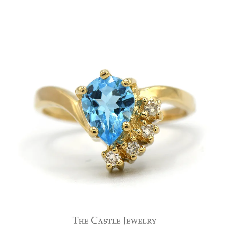 Stackable Engagement Rings-Pear Cut Blue Topaz Ring with Diamond Accents in 14k Yellow Gold